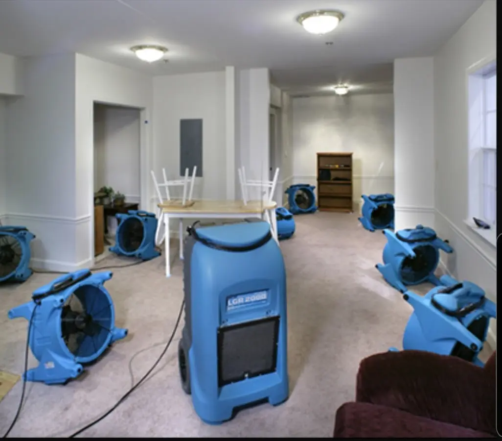 Air movers and dehumidifier setup for Water Extraction & Removal in Kirtland